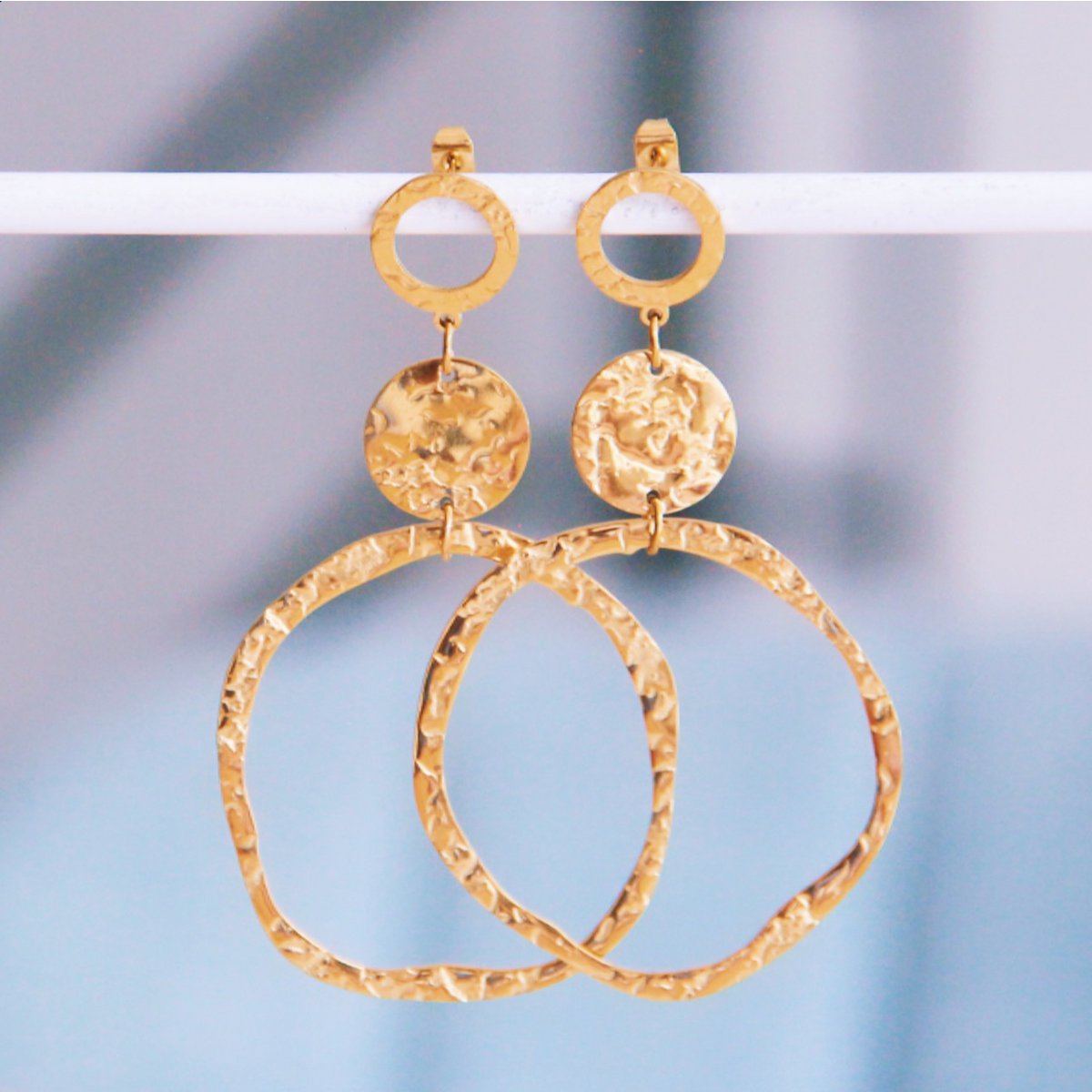 Statement earring round hammered rings