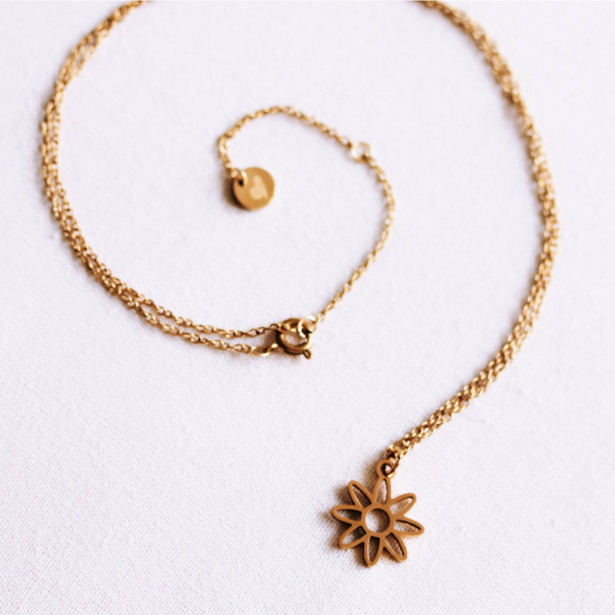 Delicate necklace with open sun