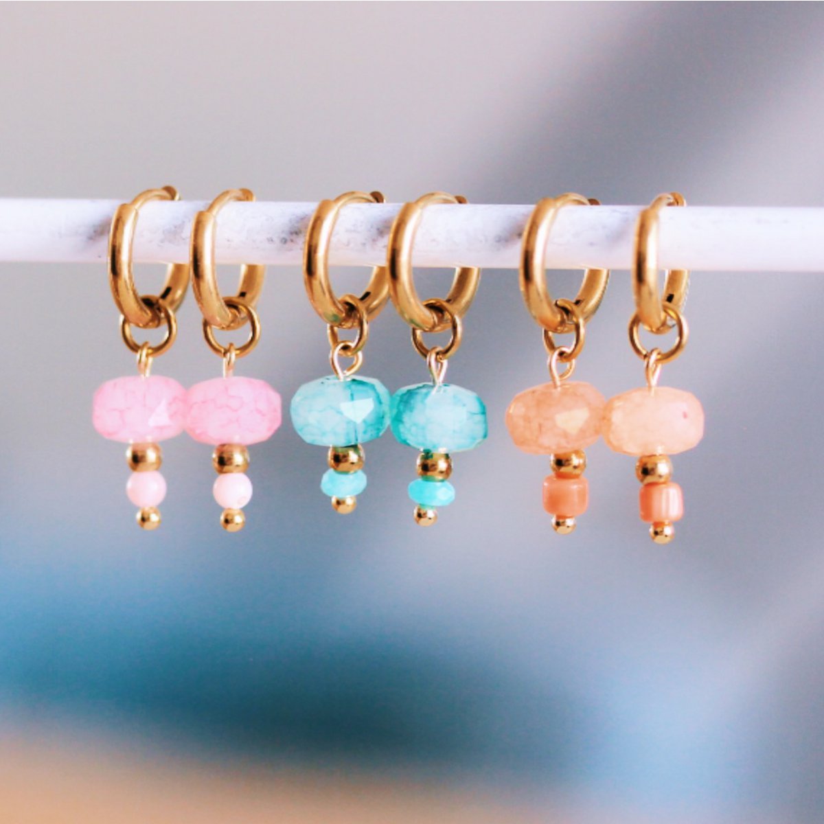 Stainless steel hoop earring with facet and stone - pink