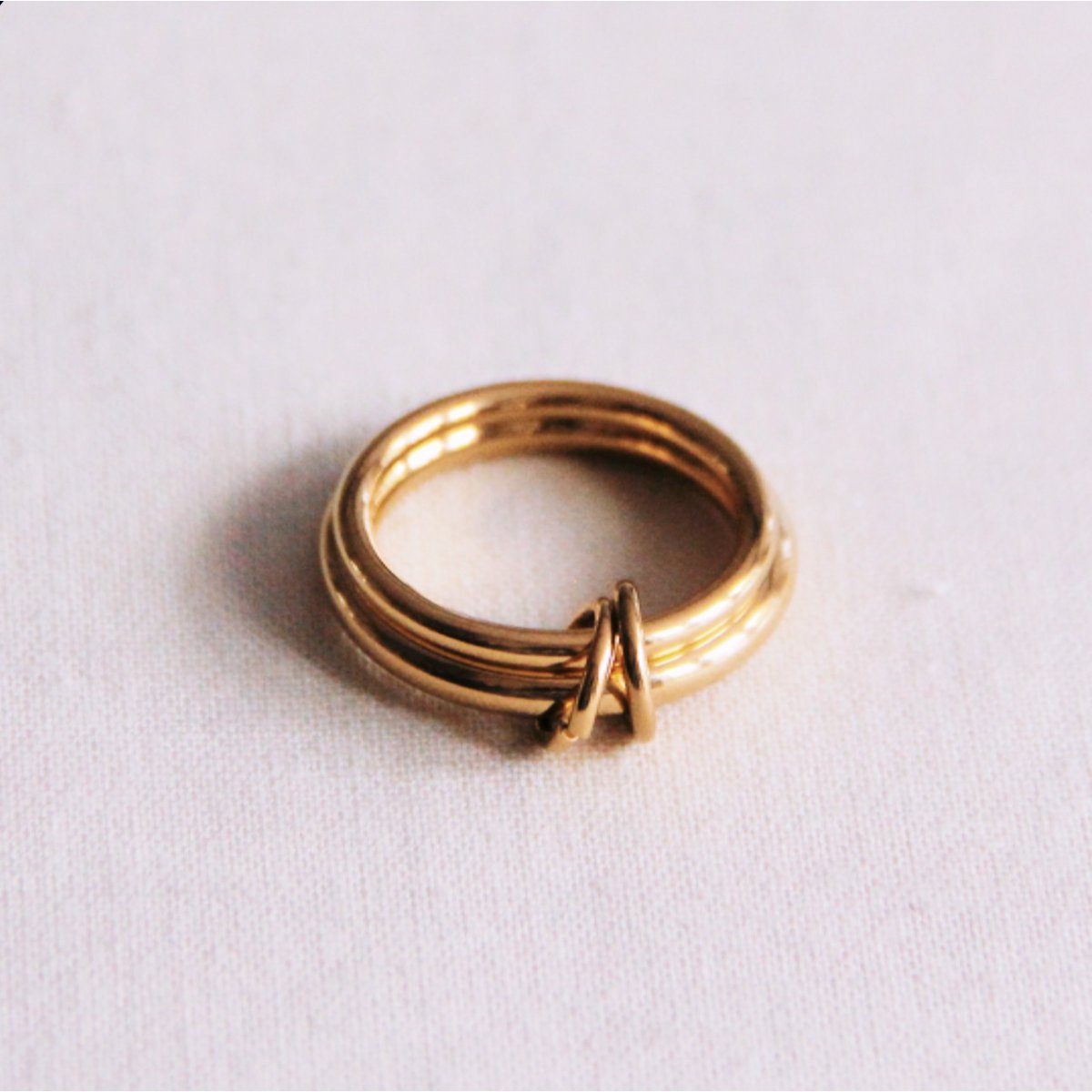 Double ring connected with rings - gold