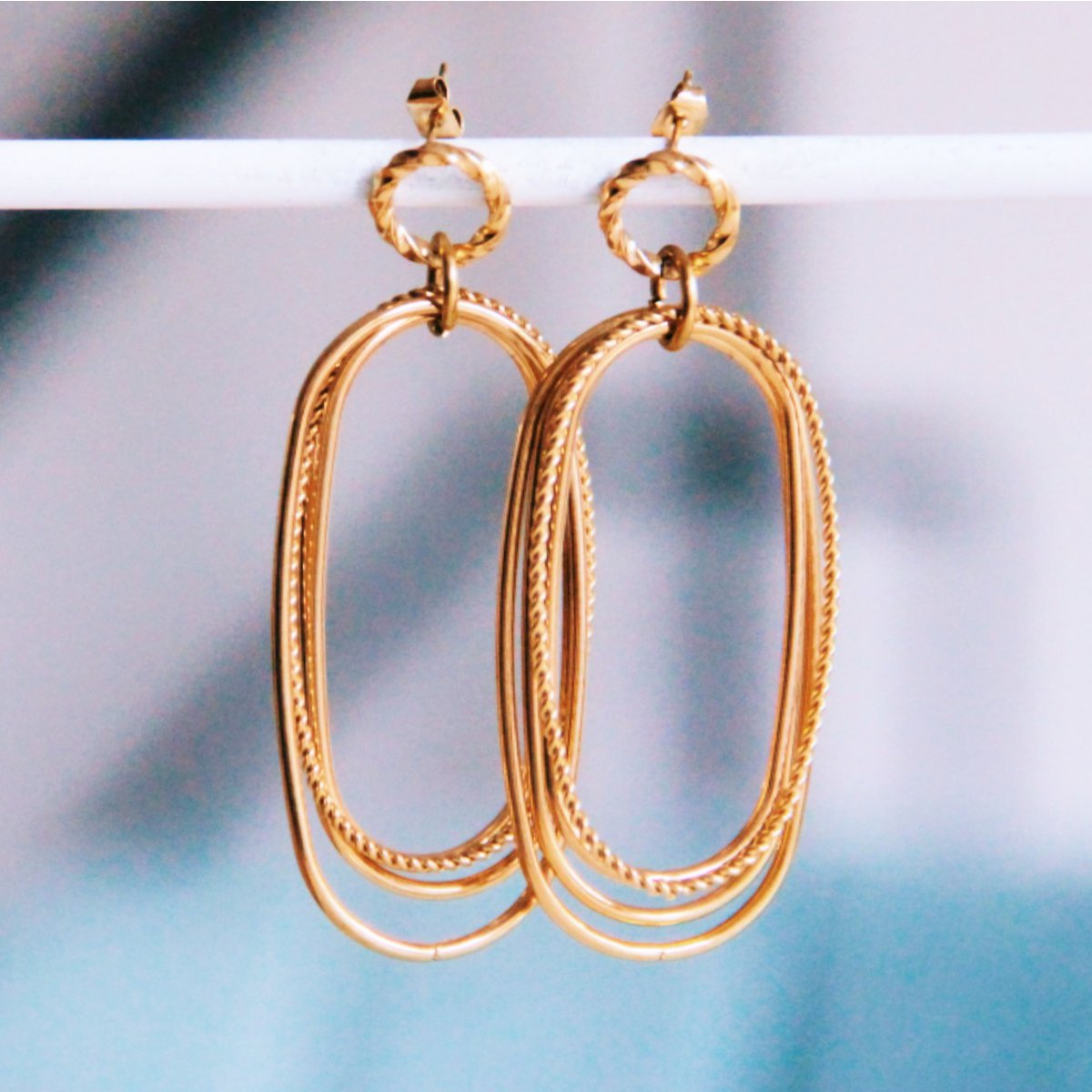 Statement earring oval and twisted rings