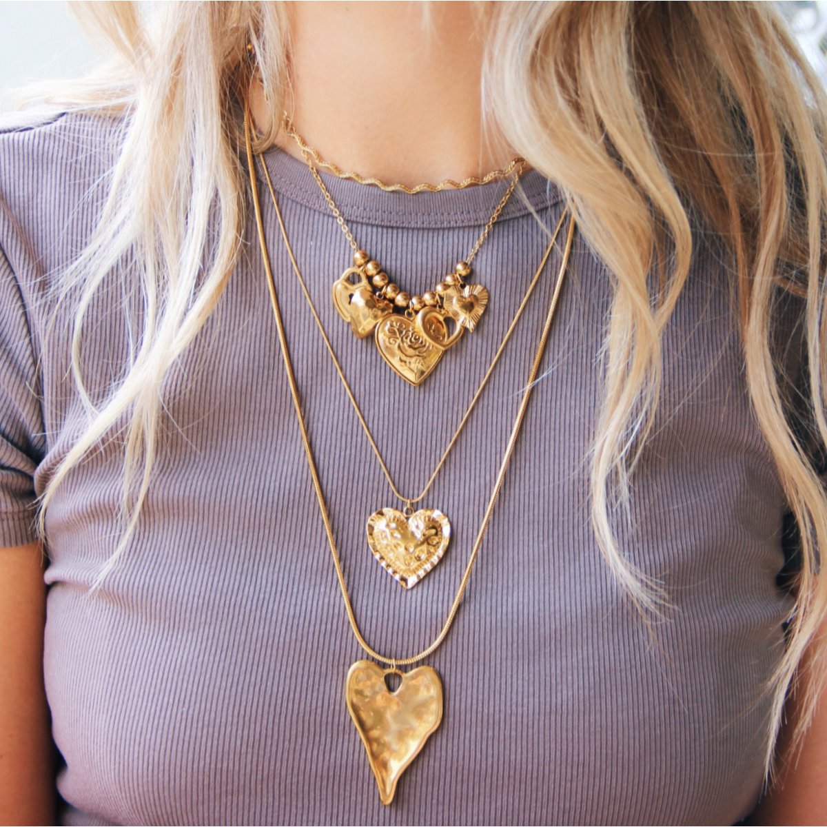 Long snake necklace with XL heart
