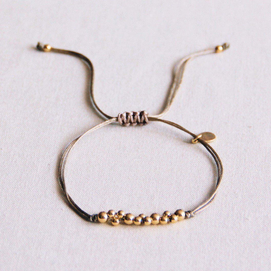 FW107 - Satin bracelet with gold colored beads - taupe / gold