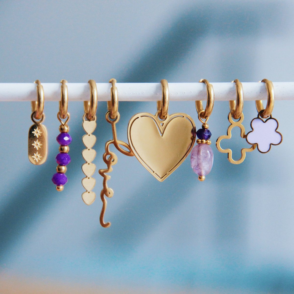 Stainless steel earrings with closed heart - gold