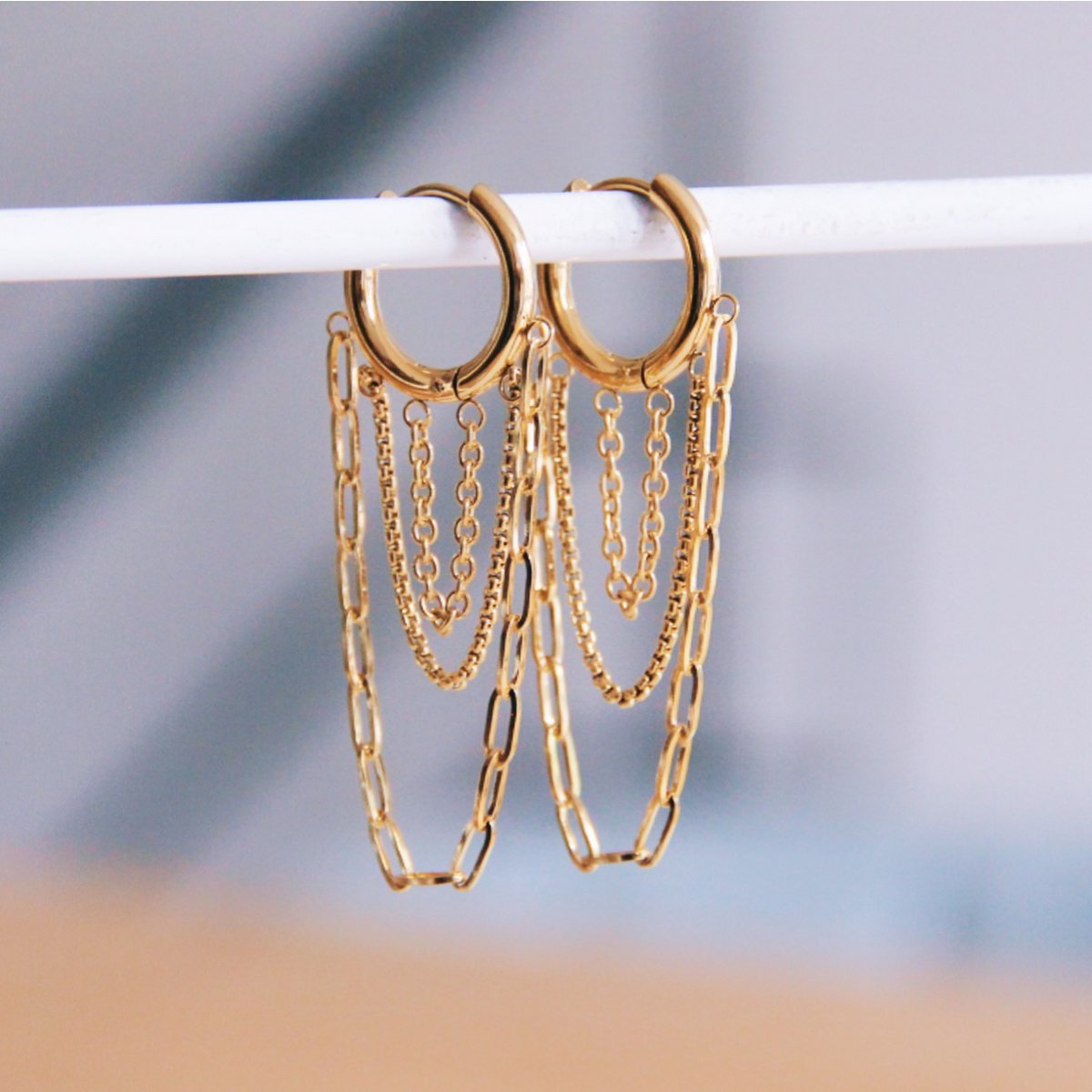 Stainless steel hoop earring with chains - gold