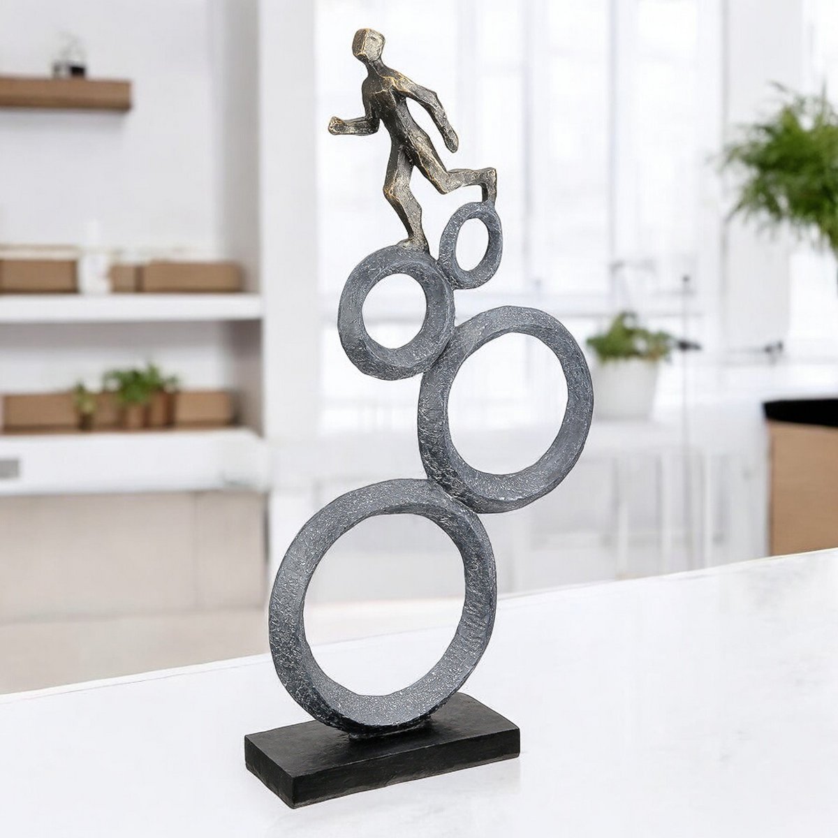 Sculpture Running, anthracite-colored, copper-colored H.47 cm