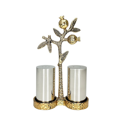 Gold salt and pepper shakers with pomegranate holder