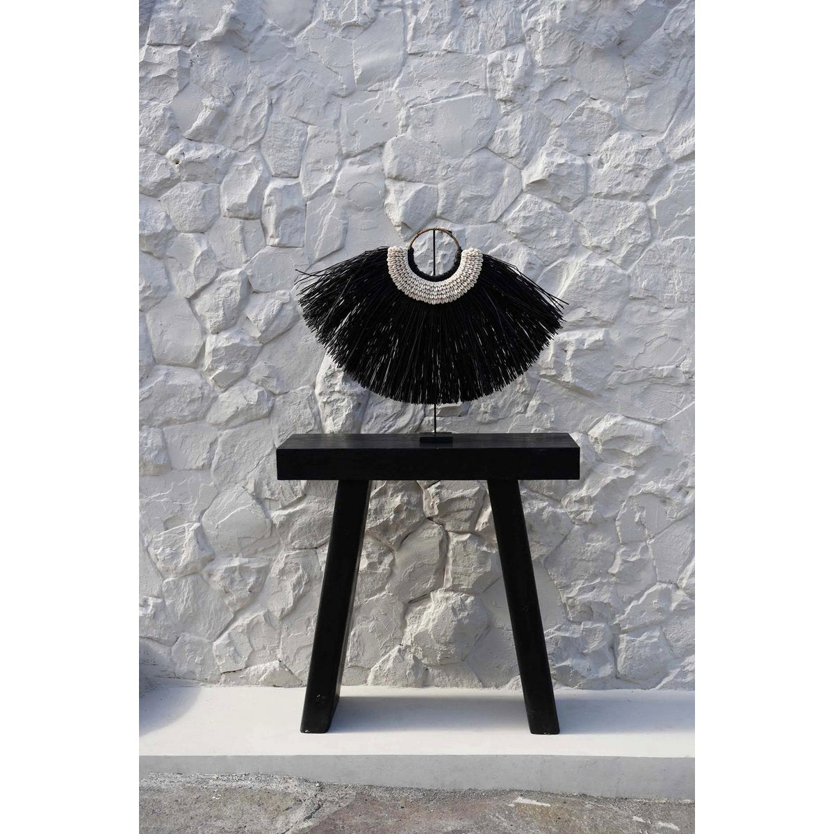 The Alang Cowrie on Stand