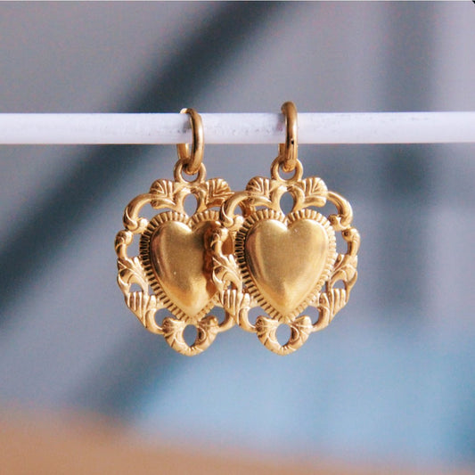 Stainless steel hoop earrings with baroque heart