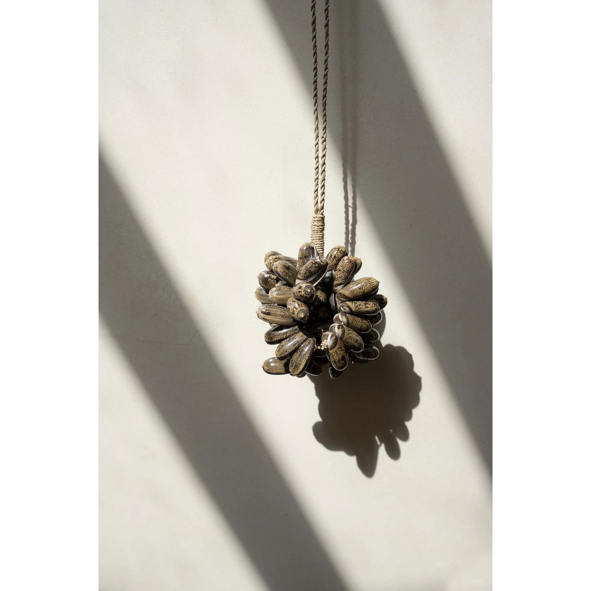 The Brown Cowrie Shell Tassel