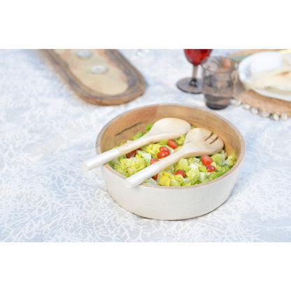 Saladier and white salad and mango salad cutlery