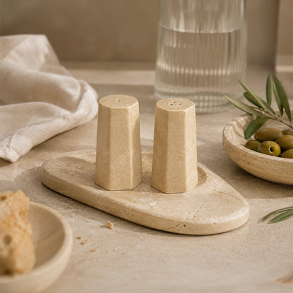 Salt and pepper shakers in travertine effect resin