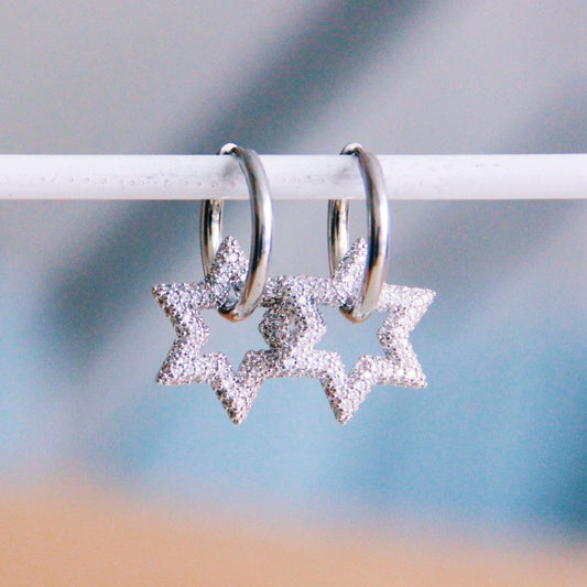 Stainless steel hoop earring with crystal star - silver