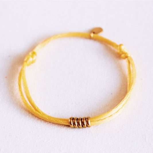 Satin bracelet with rings – yellow/gold