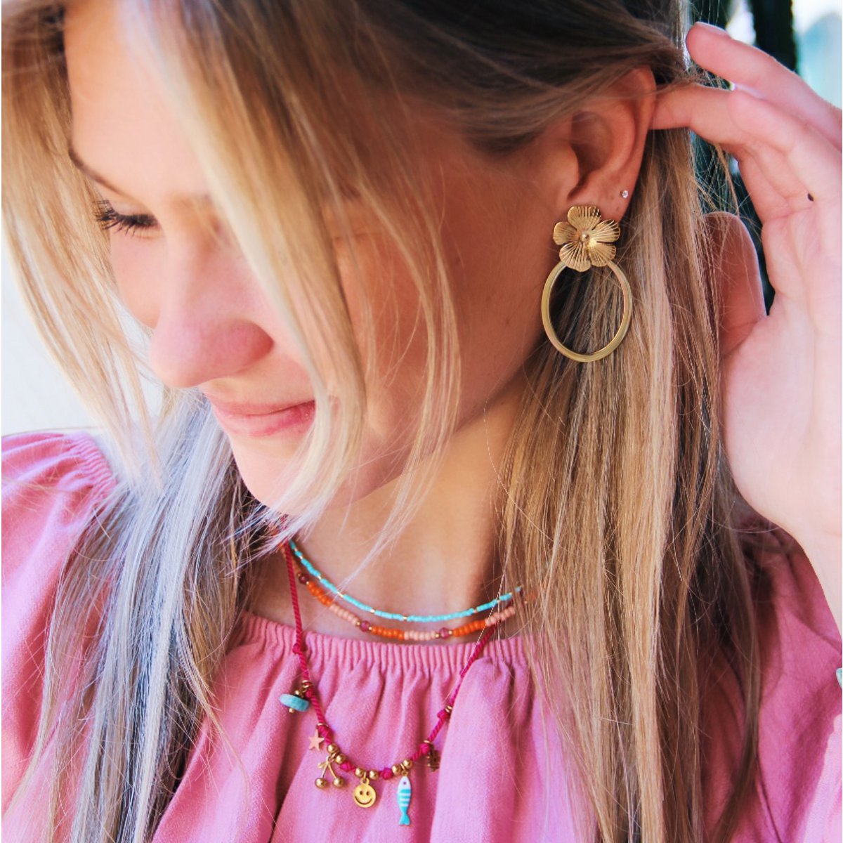 Oval statement earrings with flower