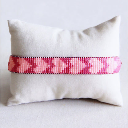 Woven bracelet with hearts - hot pink/peach
