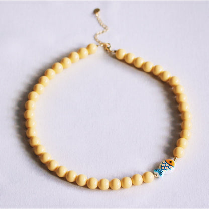 Beaded necklace with fish - yellow