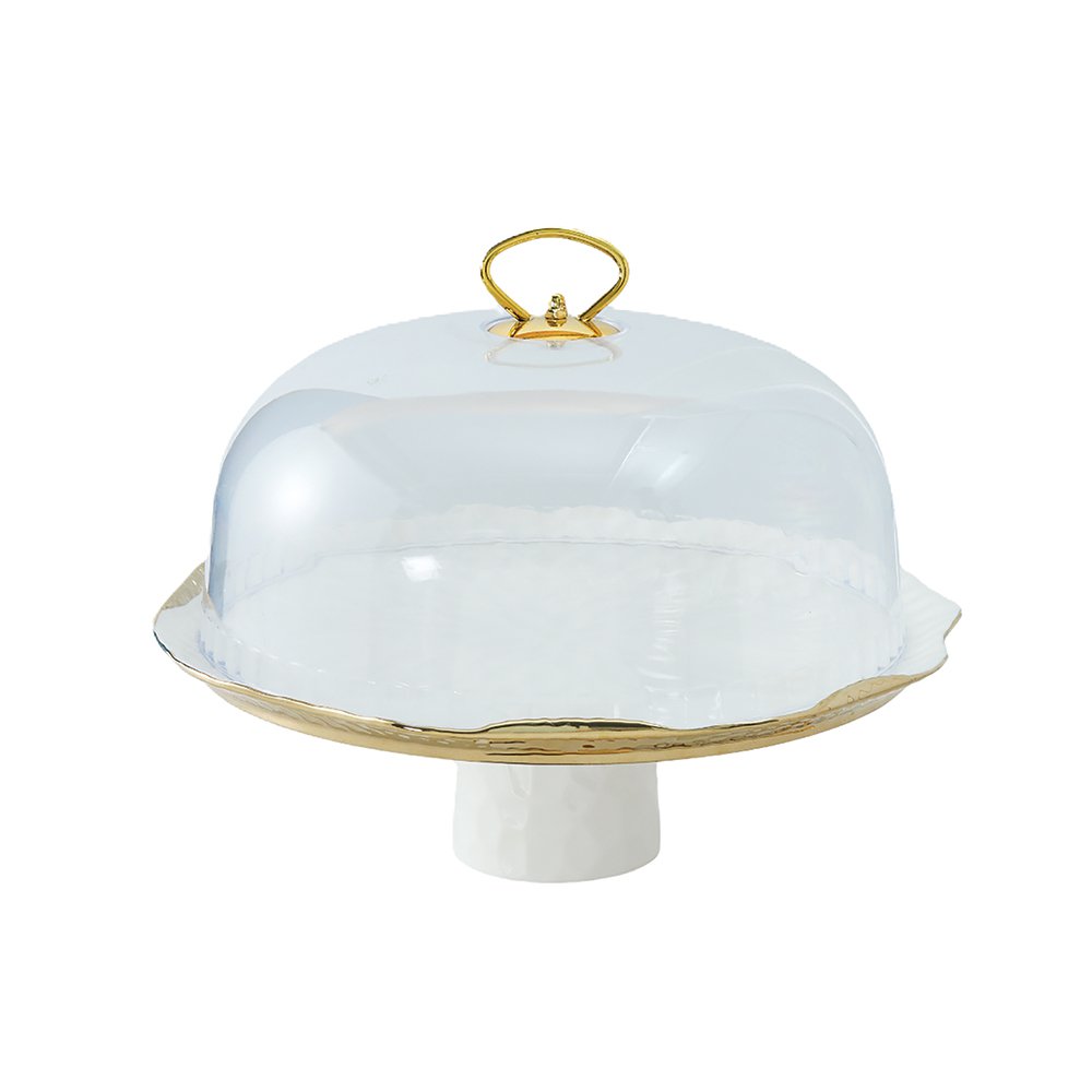 White porcelain cake bell with gold edges with pie shovel