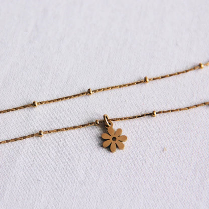 Fine anklet with daisy flower – gold