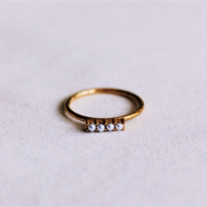Minimalist ring with pearl bar