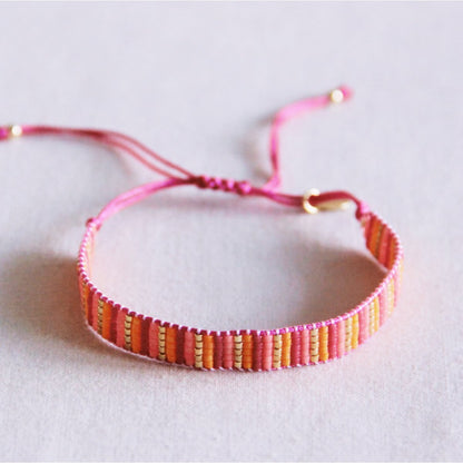 Stripes woven bracelet - pink/orange