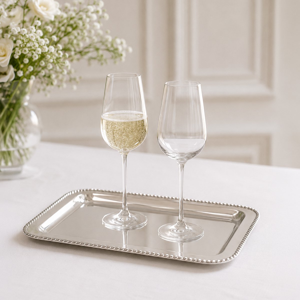 Rectangular silver stainless steel tray with twisted edge