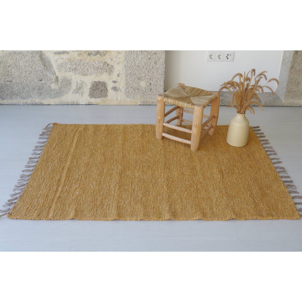 Hand-woven recycled cotton rug