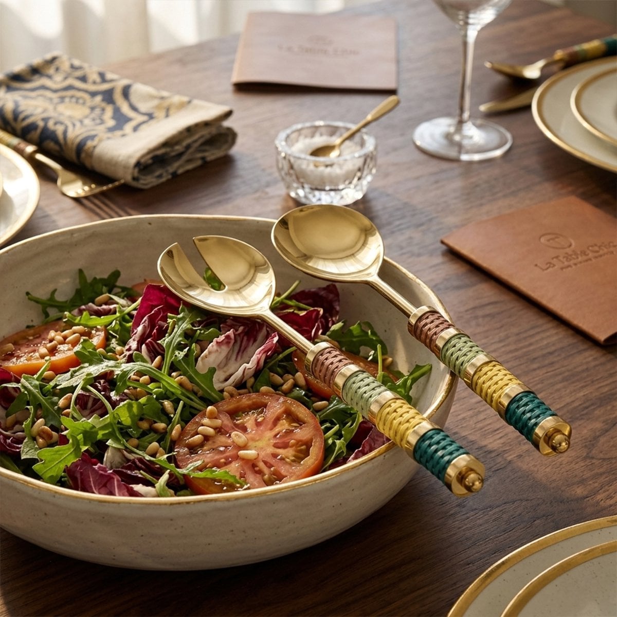 Gold salad servers with multi-colored braided handle