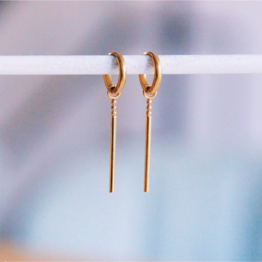 Stainless steel hoop earrings with bar and dots - gold
