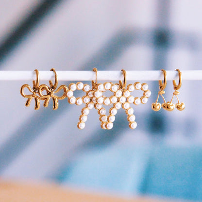 Stainless steel hoop earrings with bow