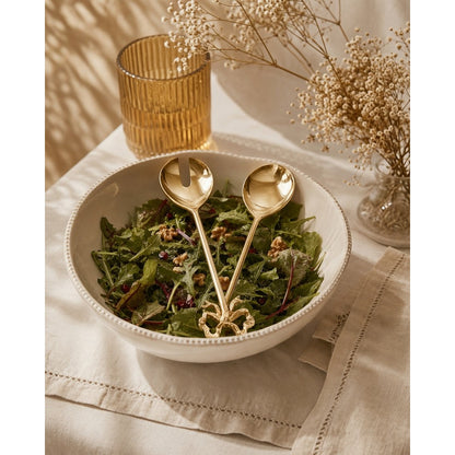 Salad servers with golden knots