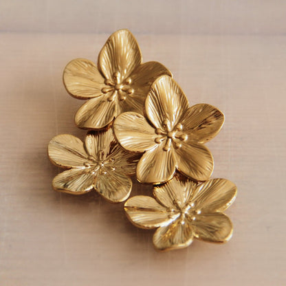 Stainless steel statement earring 2 flowers - gold