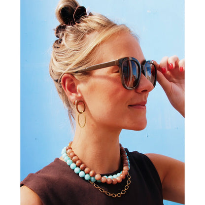 Earrings with linked oval rings - gold