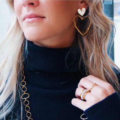 Statement earring with mother of pearl and open heart