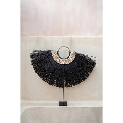 The Alang Cowrie on Stand