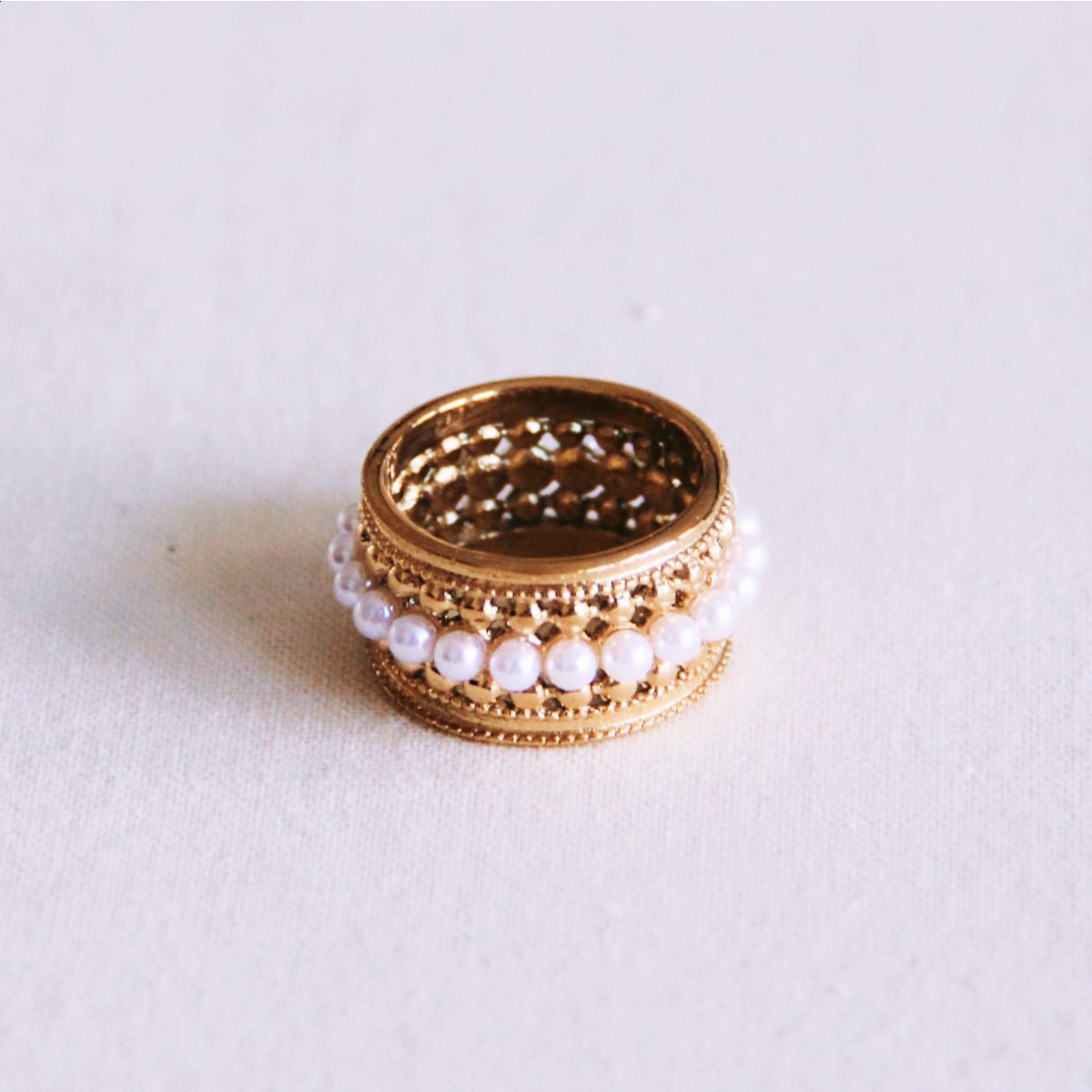 Statement ring with mini pearls