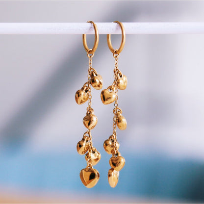 Stainless steel hoop earring with heart chain