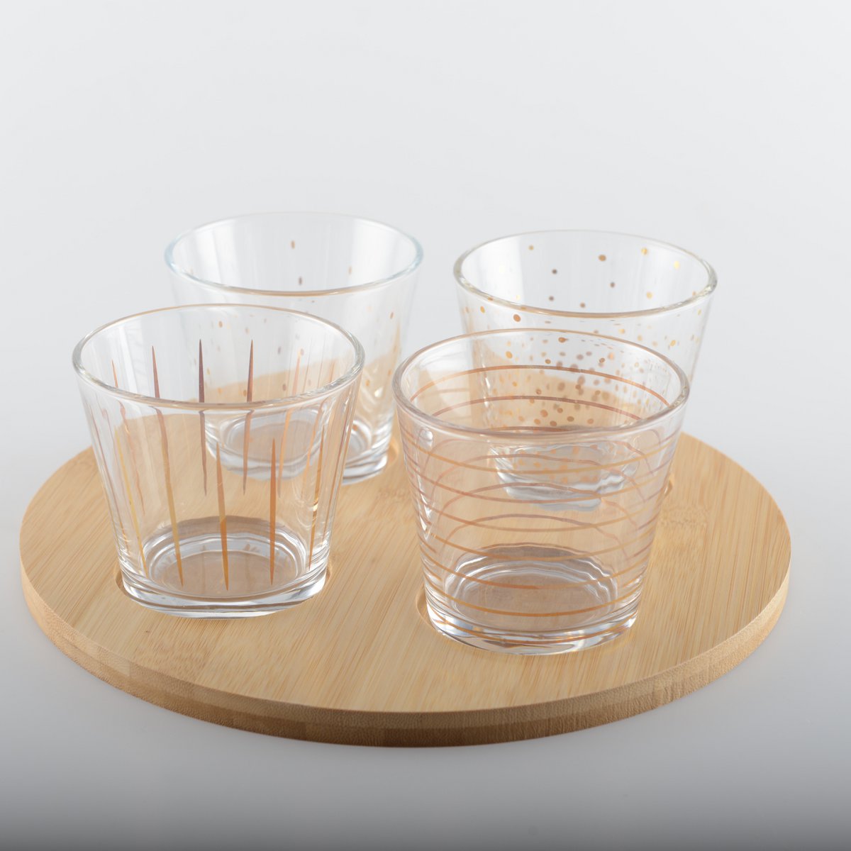 Set of 4 golden cups with wooden tray