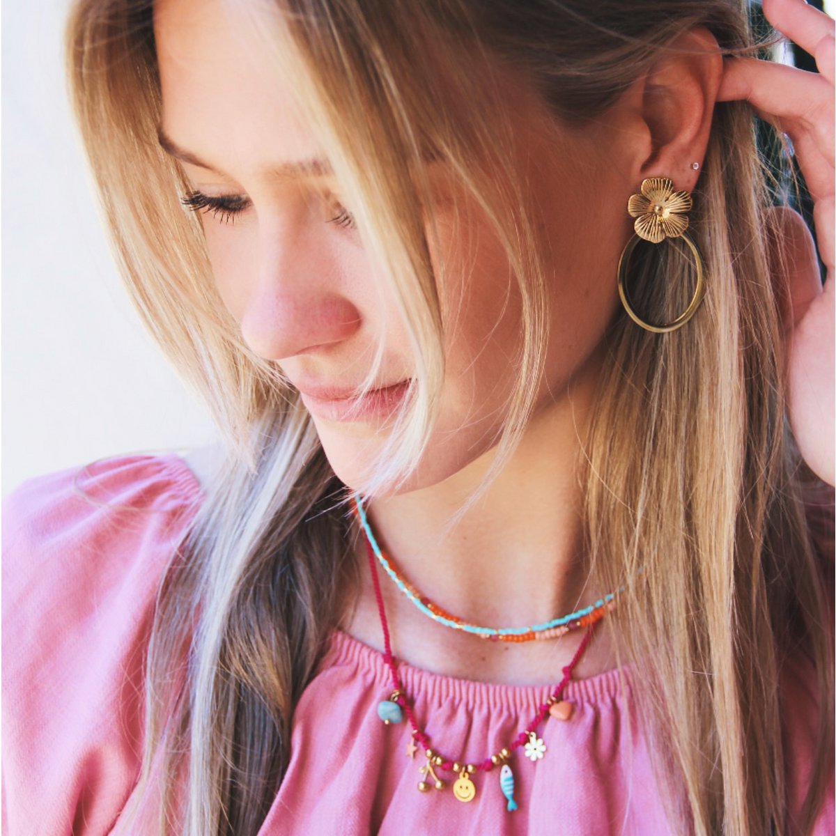 Oval statement earrings with flower