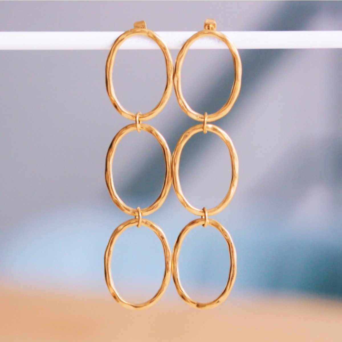 Long oval statement earring