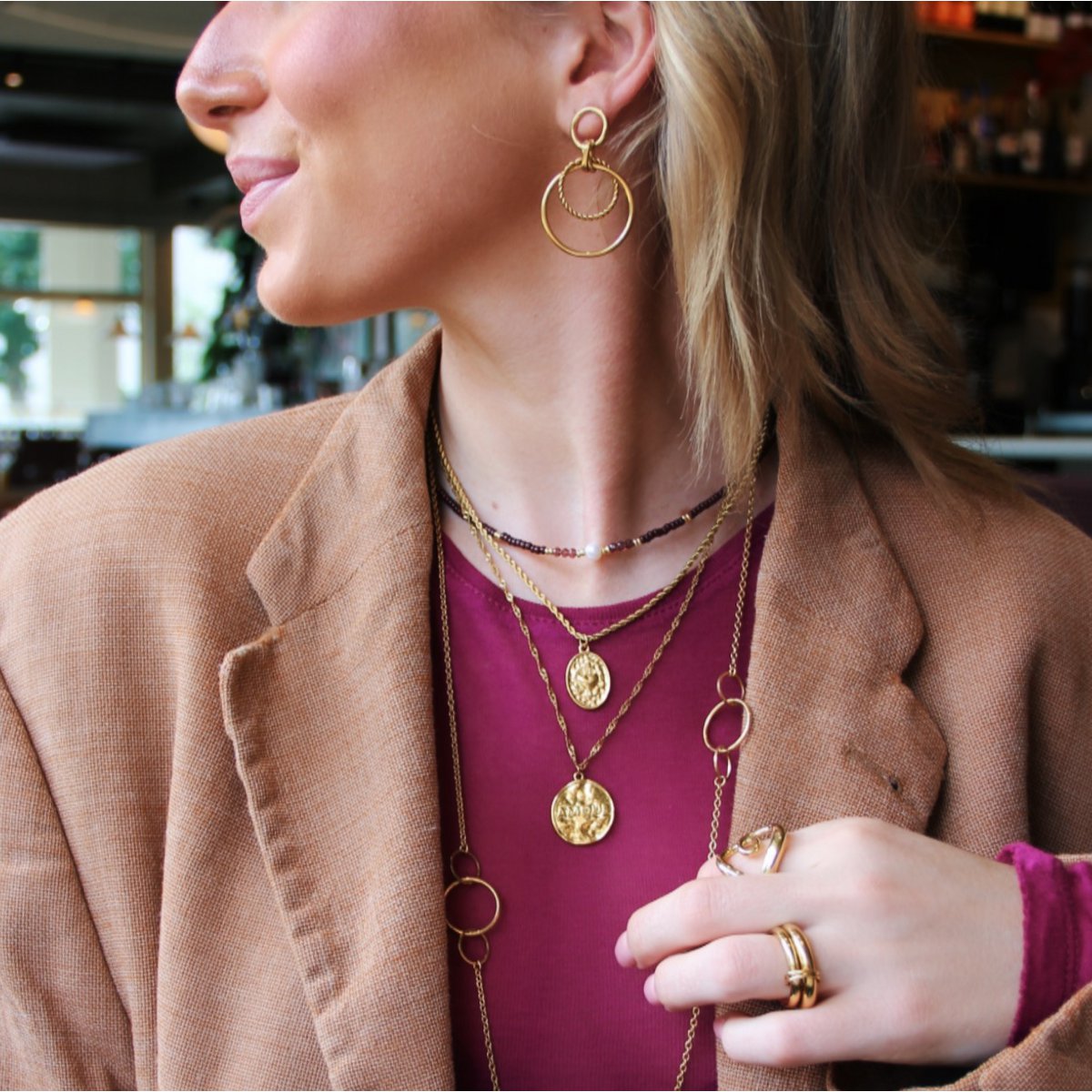 Long, fine snake chain with a mother-of-pearl heart