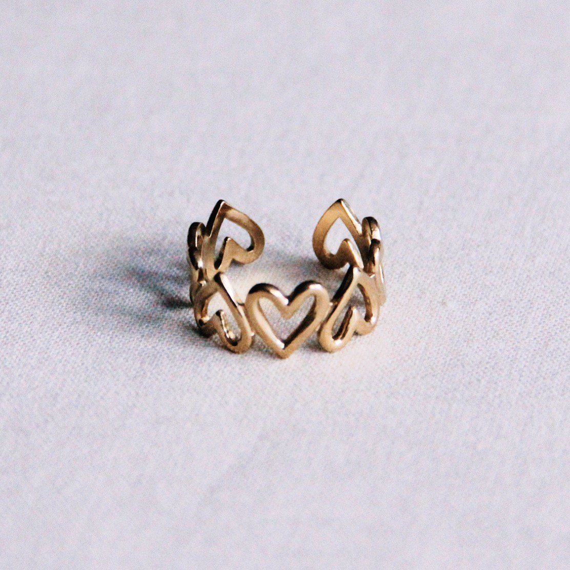 Stainless steel adjustable ring with heart – gold