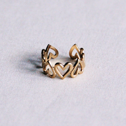 Stainless steel adjustable ring with heart – gold