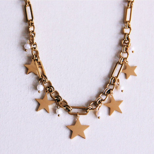 Charm necklace with stars and mini pearls