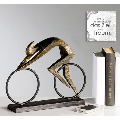 Poly/metal sculpture "Racer" bronze colored L.36.5/H28.5