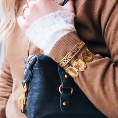 Wide bangle with open pattern