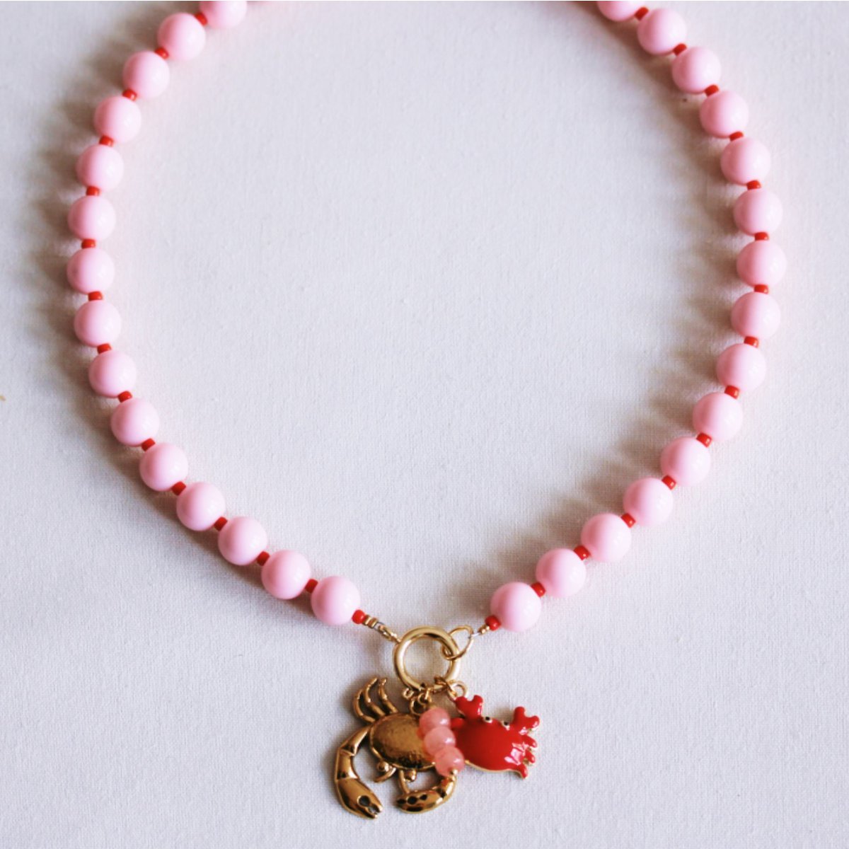Beaded necklace with Miyuki beads with charms - light pink/red