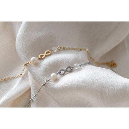 Infinity & Parel Armband - Goud