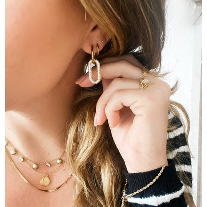 Stainless steel earring with oval crystal pendant - gold