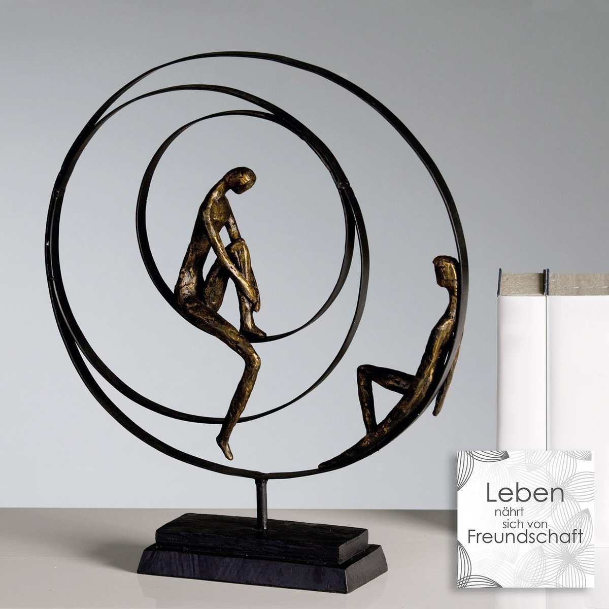 Poly/metal sculpture "Patience" bronze colored H41/W34cm